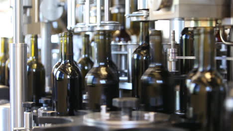 Close-up-shots-of-automation-along-the-assembly-line-inside-a-wine-bottling-factory-9