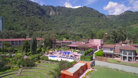 Aerial-over-a-mansion-estate-or-villa-along-the-shoreline-of-Lake-Amatitlan-in-Guatemala