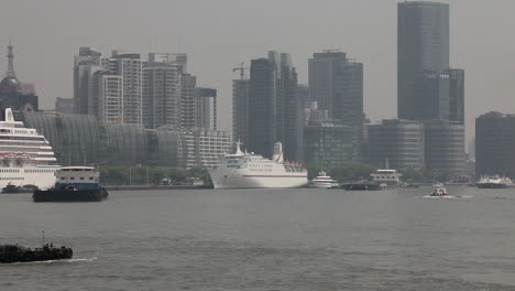 The-skyline-of-Shanghai-China-with-river-traffic