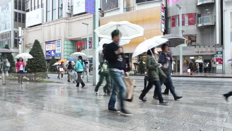 People-walk-on-the-rainy-streets-of-Shanghai-China
