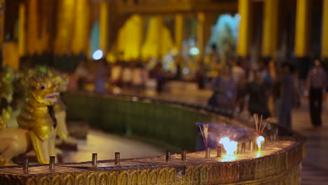 Candles-burn-at-a-Burmese-temple