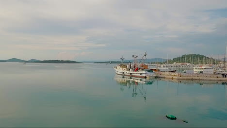 Rising-aerial-over-a-coastal-fishing-village-in-Croatia