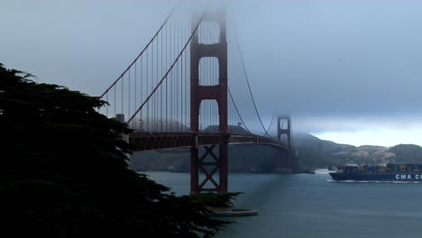 A-cargo-barge-passes-under-the-Golden-Gate-Bridge