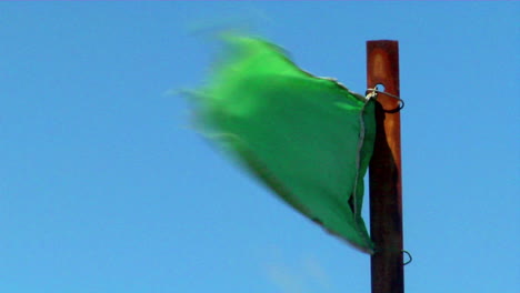 A-green-flag-blows-in-the-wind