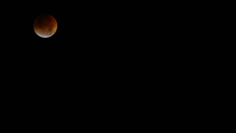 Time-lapse-of-a-lunar-eclipse-with-moon-moving-across-frame-1