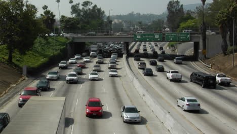 Traffic-moves-slowly-along-a-busy-freeway-in-Los-Angeles-10