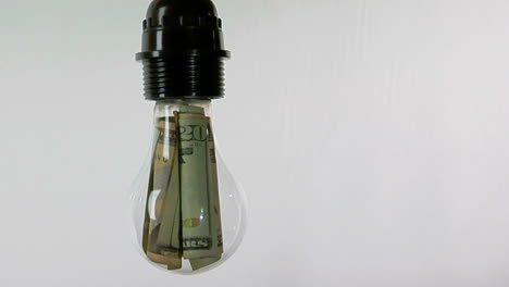 A-light-bulb-contains-twentydollar-bills