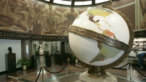 A-large-globe-turns-in-a-museum-or-planetarium