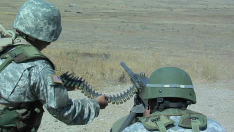 A-soldier-fires-an-automatic-weapon