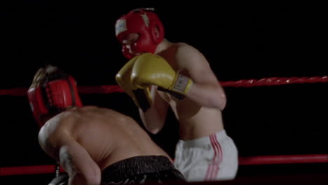Two-boxers-fight-in-a-boxing-ring