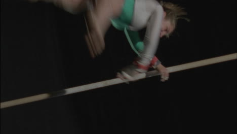 A-gymnast-performs-on-the-uneven-bars