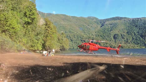 Helicopter-landing-on-a-beach-at-Ceasar-Lake-in-Parque-Nacional-Corcovado-during-the-flyfishing-trip-in-Southern-Chile