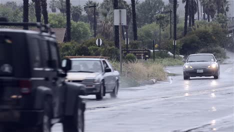 Cars-driving-on-a-wet-road-after-heavy-rain-in-Ventura-California