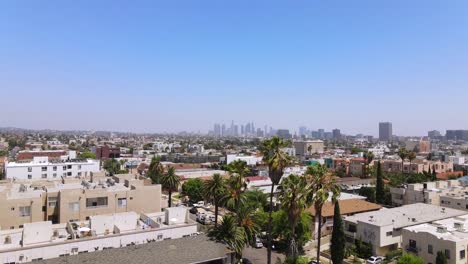 Rising-Vista-Aérea-From-Middle-Class-Area-Near-Hollywood-California-With-Downtown-Los-Angeles-In-Distance