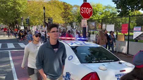 A-Police-Car-Is-Parked-Next-To-A-Black-Lives-Matter-Display-In-Washington-Dc