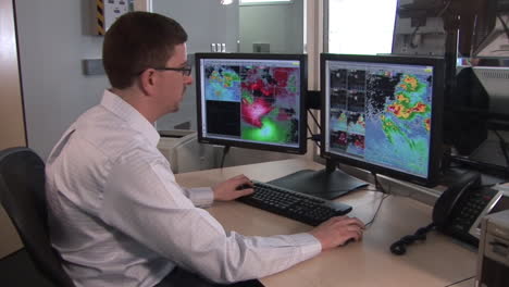 A-Weather-Forecaster-At-The-National-Weather-Center-Uses-Doppler-Radar