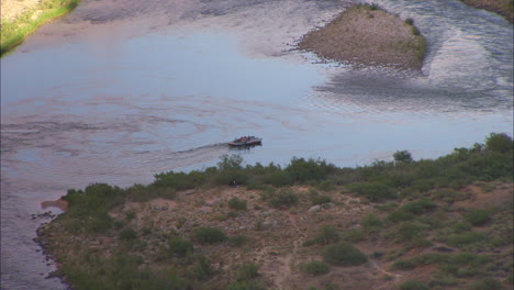 Pull-Back-From-Rafters-In-The-Grand-Canyon-To-The-Rim