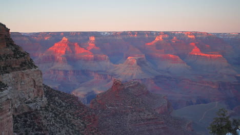 Panning-Shot-Of-Grand-Canyon-Rim-At-Sunrise-Or-Sunset-In-Winter