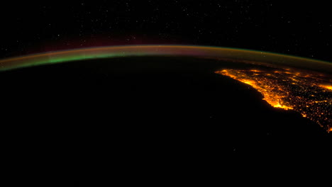 The-International-Space-Station-Flies-Over-The-Aurora-Borealis-2
