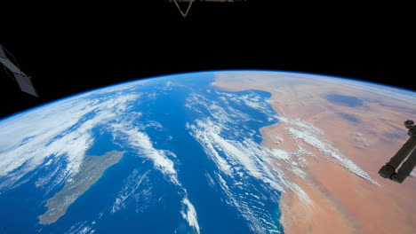 The-International-Space-Station-Flies-Over-The-Earth-By-Day