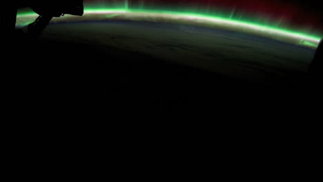 The-International-Space-Station-Flies-Over-The-Earth-With-Aurora-Borealis-Visible-2