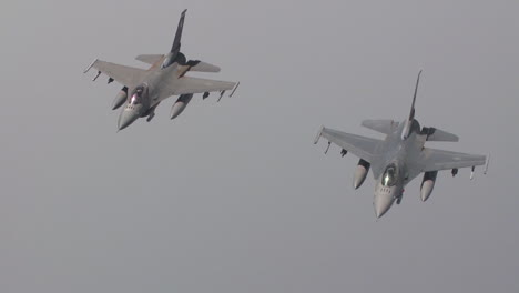 Two-Air-Force-F16-Jet-Fighters-Fly-In-Formation