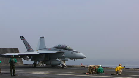 A-Fighter-Jet-Takes-Off-From-An-Aircraft-Carrier