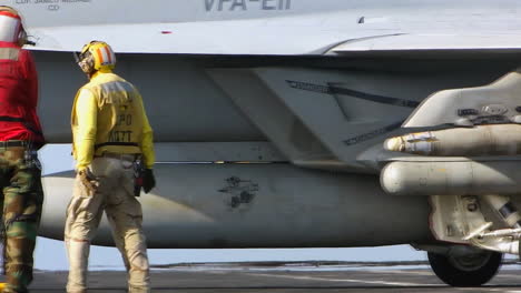 Fighter-Jets-Prepare-To-Take-Off-From-An-Aircraft-Carrier