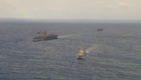 Aerials-Over-An-Aircraft-Carrier-And-Strike-Group-On-The-High-Seas