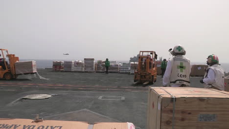 The-Deck-Of-A-Us-Aircraft-Carrier-Is-Prepared-For-A-Humanitarian-Airlift-3