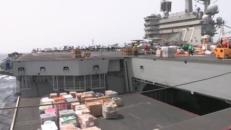 The-Deck-Of-A-Us-Aircraft-Carrier-Is-Prepared-For-A-Humanitarian-Airlift-4