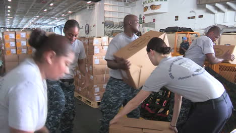 The-Deck-Of-A-Us-Aircraft-Carrier-Is-Prepared-For-A-Humanitarian-Airlift-5