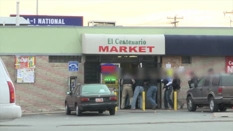 Special-Agents-From-The-Us-Immigration-And-Customs-Service-Raid-A-Mexican-Mini-Mart-To-Make-Arrests