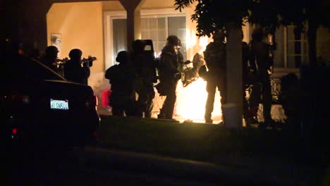 Los-Angeles-Police-And-Federal-Agents-Raid-A-Residence-In-Los-Angeles