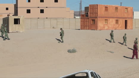 United-States-Troops-Practice-Various-Dangerous-Scenarios-In-A-Mock-Arab-Village-In-The-American-Desert