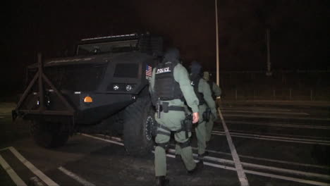 A-Swat-Team-Uses-Military-Style-Vehicles