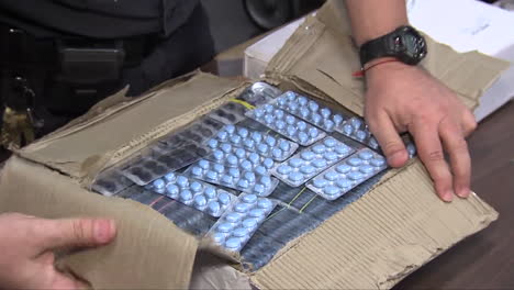 Agents-From-Us-Customs-Seize-Fake-Prescription-Drugs-At-A-Shipping-Facility-3