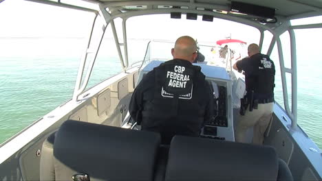 The-Us-Customs-And-Border-Protection-Apprehend-Suspected-Criminals-On-A-Speedboat