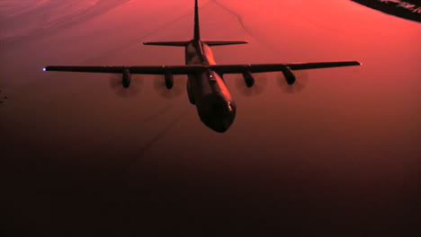 Aerials-Of-The-Us-Air-Force-Air-Mobility-Command-C130J-In-Flight-At-Sunset