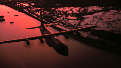 Aerials-Of-The-Us-Air-Force-Air-Mobility-Command-C130J-In-Flight-At-Sunset-1