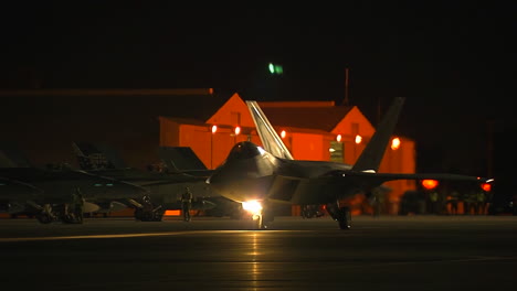 An-Air-Force-F35-Fighter-Jet-Taxiing-On-A-Runway-At-Night