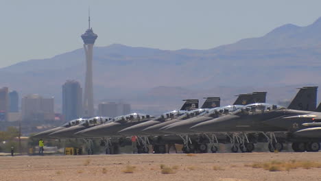 Numerous-F15-And-F16-Fighter-Jets-Line-Up-And-Taxi-For-Takeoff-In-A-Military-Exercise