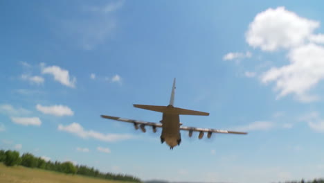 A-C130-Cargo-Plane-Lands-On-A-Dirt-Runway