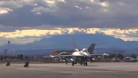 F15-And-F16-Fighter-Jets-Line-Up-And-Taxi-For-Takeoff-In-A-Military-Exercise-7