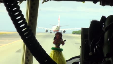 Pov-From-The-Cockpit-Of-A-Large-Military-Aircraft-Taxiing-With-A-Hula-Girl-Doll-Bobbling-Around