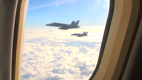 Pov-Out-Of-The-Window-Of-A-Plane-With-Fighter-Jets-Outside-2
