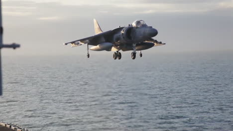Marine-Harrier-Aircraft-In-Action-On-The-Deck-Of-An-Aircraft-Carrier