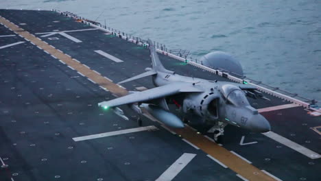 Marine-Harrier-Aircraft-In-Action-On-The-Deck-Of-An-Aircraft-Carrier-2