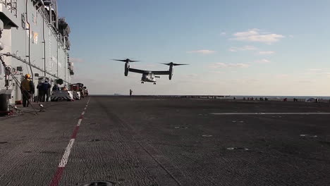 A-V22-Osprey-Helicopter-Lands-On-The-Deck-Of-An-Aircraft-Carrier
