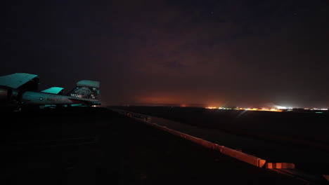 Night-To-Day-Time-Lapse-Of-Aircraft-Carrier-Through-The-Suez-Canal